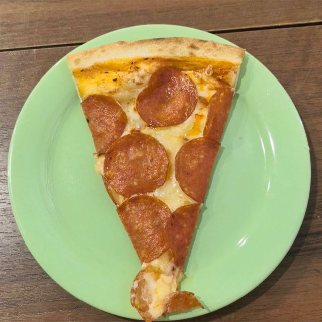 Representative photo: Pepperoni pizza on a plate. Not this venue.