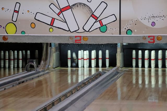 Representative photo: Ball knocking down candlepin, Bayberry 2026-02-28. Not this venue.