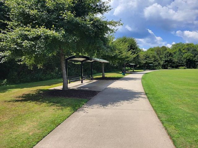 Representative photo: Etowah River Park walking path, Canton GA. Not this venue.