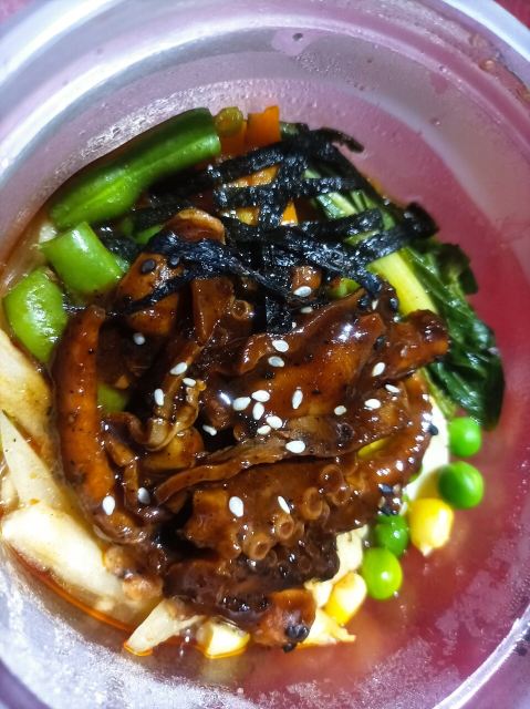 Representative photo: Fusion of Japanese and Meitei cuisines - Mixed bowl of octopus ramen noodles and traditional Meetei vegetables - Imphal, Kangleipak (Manipur) 02. Not this venue.