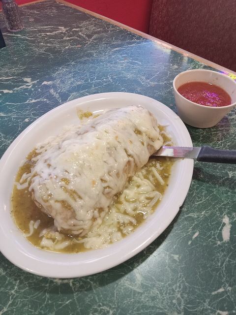 Representative photo: Mexican Food vegetarian green Salsa Burrito with Bell pepper onion sour cream and lettuge inside 20260504 154956 (9). Not this venue.