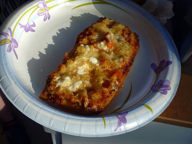 Representative photo: Deep-fried pizza on paper plate. Not this venue.
