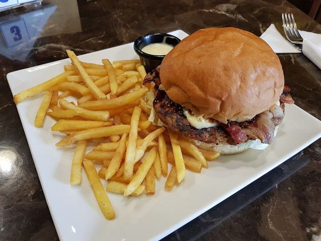 Representative photo: Hamburger with beef bacon. Not this venue.
