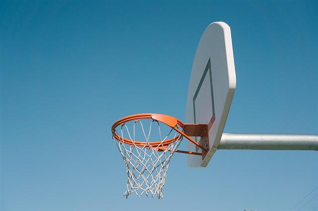 Representative photo: Basketball hoop and court. Not this event.