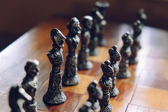 Representative photo: Chess pieces on a board. Not this event.